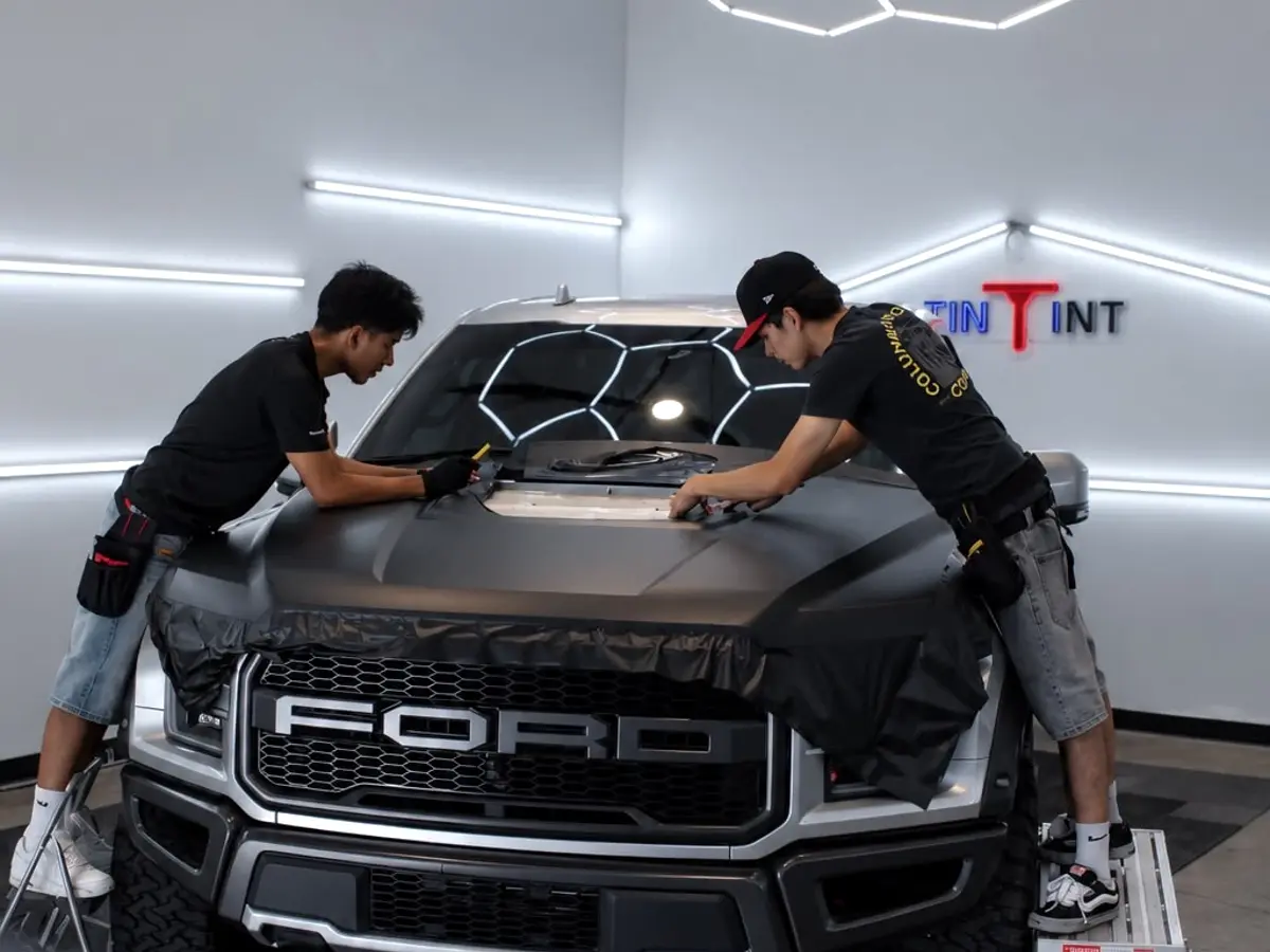 Irving and the TinTinT team installing wrap on a Ford Raptor